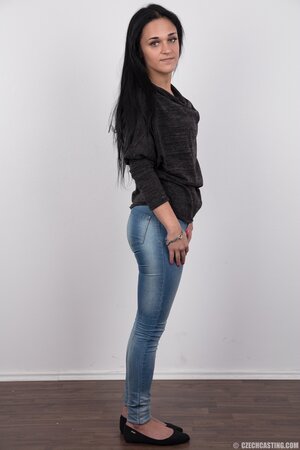 Young brunette woman works as babysitter and has to pass the striptease test