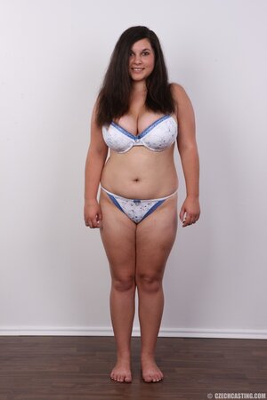 Sexy pornstar isn't ashamed of perfect body and shows off her bulky coconuts