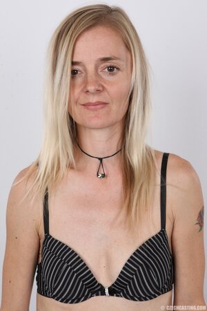 Photographer has never seen before such small boobs as blonde shows off