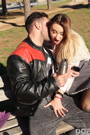 Blonde slut in sexy stockings enjoys biker fooling around with her in nature