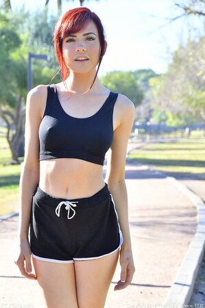 During workout in backyard skinny redhead decides to do yoga without clothes