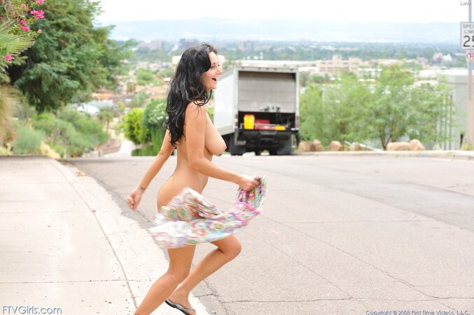 Horny French MILF Ava Addams with big boobies gets undressed in broad daylight