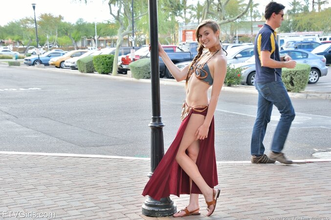 Barbie in a cosplay suit walks the city and shoves dildo inside pussy