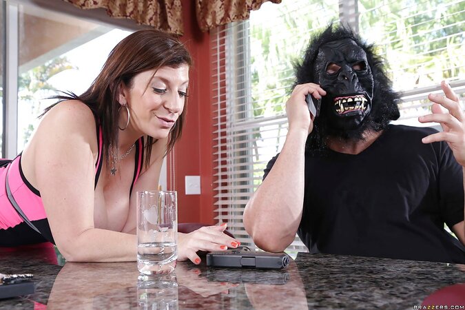 Pornstar loves sex very much and makes a pass at man in a monkey mask