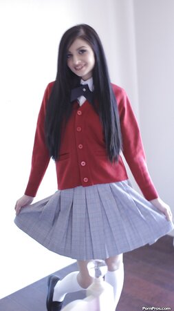Long-haired brunette can flash private parts without taking off college uniform
