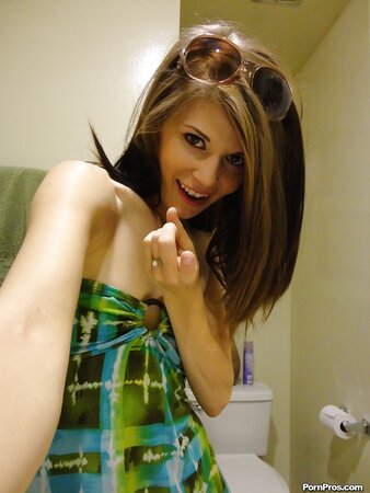 Girl in sunglasses invites friend to take pictures of small tits and shaved pussy