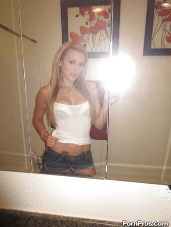 Girl with small boobs and roses tattoo comes to bathroom for taking naked pics