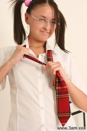 Bawdy babe in student uniform has a dummy to calm down her cock loving tendencies