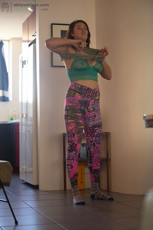 Perverted guy takes pictures of the adorable stepsister putting on the clothes