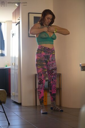 Perverted guy takes pictures of the adorable stepsister putting on the clothes