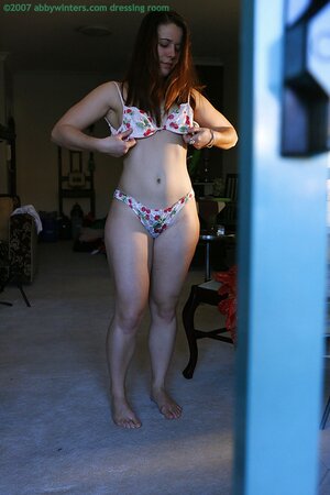 Curvy amateur Lilou changes clothes after hardcore sex in the dark room