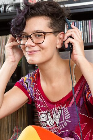 Young science geek with curly short hair isn't a fan of shaved armpits and pussy