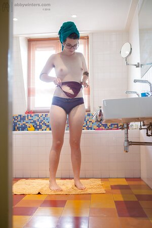 Nerdy girl with a towel on head gives perverted roommate good reason for jerking