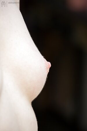 Young redhead female shows off hairy hole in the garden with no shame