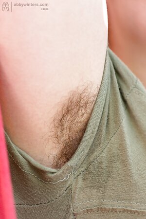 Cropped hair Kyna D removes purple tights to expose natural bush outdoors