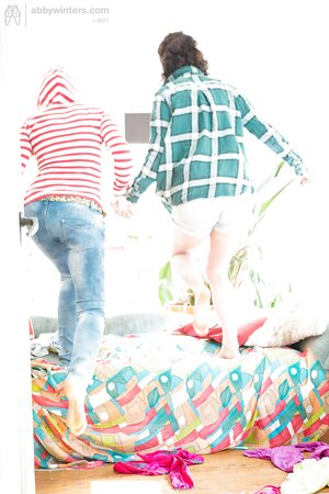 Lesbians are so careful that help each other put on clothes every morning