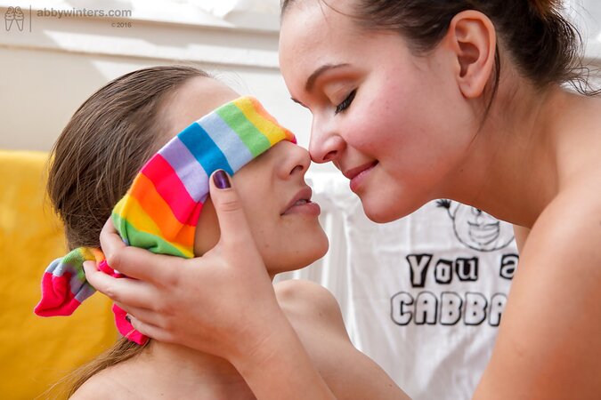 Lesbians in striped over-the-knee socks are in the mood to give pussies pleasure
