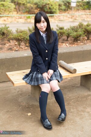 Japanese schoolgirl takes off her panties and shows up her butt in the class