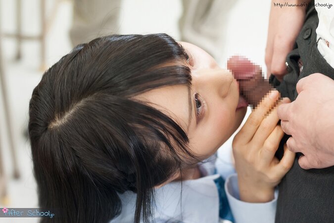 Photographer sneaks into Japanese whore's mouth filling it with cum