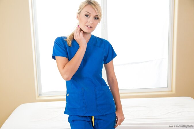 Female in a blue massage suit meets another client being completely naked
