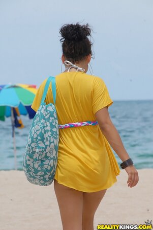 Black chick with curly hair gives up and allows photographer to spy on her