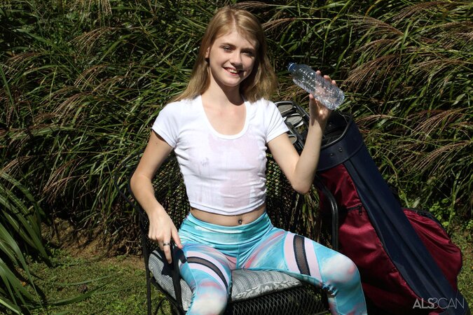 Schoolgirl peels yoga pants off to demonstrate tight pussy instead of playing golf