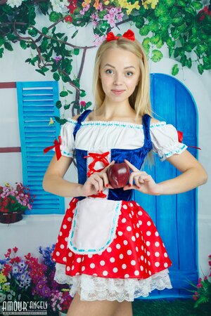 Cute fan of cosplay adds elements of striptease into her naughty photo shoot