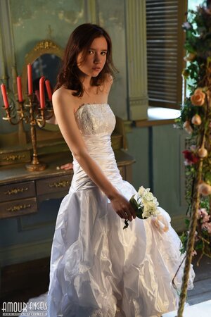 After wedding ceremony lovely bride frees natural body from the dress