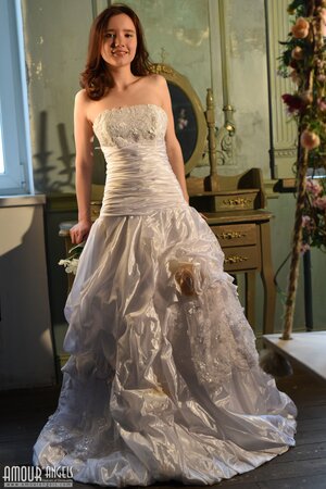 After wedding ceremony lovely bride frees natural body from the dress