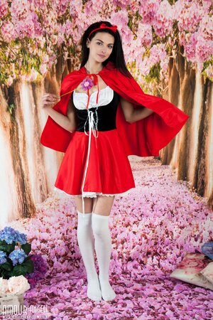 Brunette in the Little Red Riding Hood suit Stefany shows off her naked body