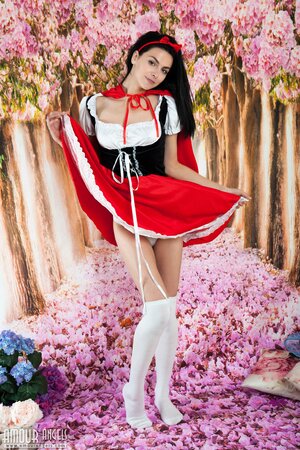 Brunette in the Little Red Riding Hood suit Stefany shows off her naked body
