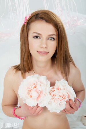 Innocent angel not shy to undress and show photographer her perfect body