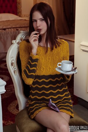 Freshly young redhead interrupts tea ceremony and strips naked near the table