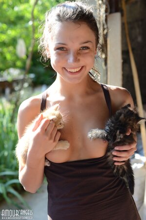 Teen sweetie with freckled face likes to walk without clothes on the beach