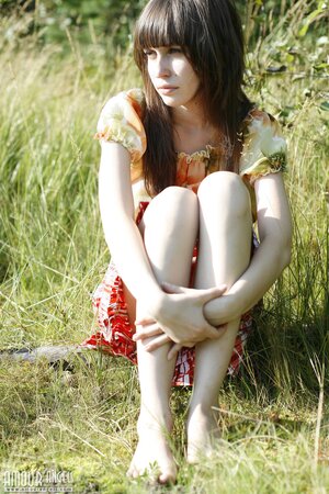 Innocent teen with bangs and slender body flashes tits and pussy by the lake