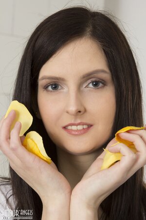 Playful brunette Bibi scatters all chips and spontaneously takes off clothes