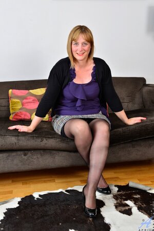 After divorce happy woman with thick body massages pussy on the sofa