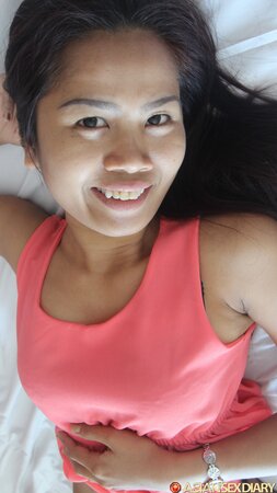 Oriental minx is rammed in her hairy snatch on white bedsheets and gets facialized
