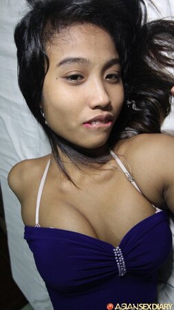 Filipina chick takes her pink underwear off and exposes trimmed cunt