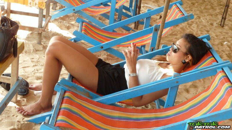 Libidinous oriental female lives stripping for man she meets on beach