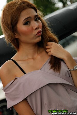 Bald guy and attractive Thai teen have nice outdoor photoshoot near rickshaw