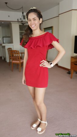 Thai slut in a red dress never stops smiling even in the backseat of a taxi