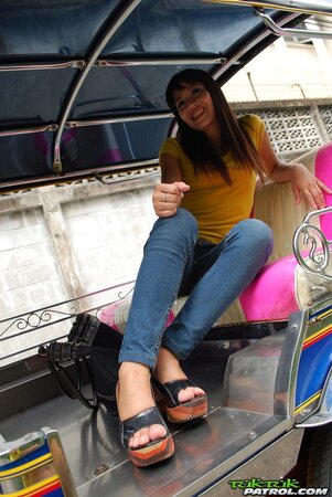 Naughty Eastern girl in yellow T-shirt and jeans finds a guy who pays for posing