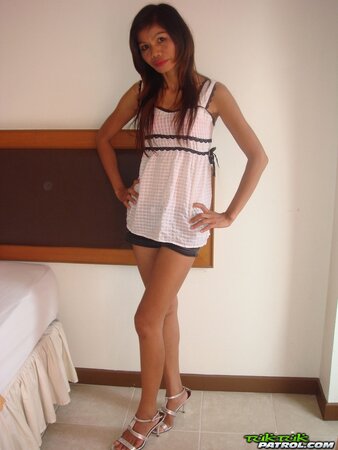 Slender Thai girl poses for guy after taking off clothes and red lingerie