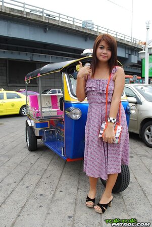 Asian teen Tukta with red hair wears sexy violet dress and prefers Tuk Tuk taxi