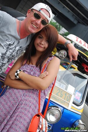 Asian teen Tukta with red hair wears sexy violet dress and prefers Tuk Tuk taxi