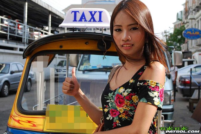Beauteous Thai babe with big black eyes bares her buttocks to be nailed