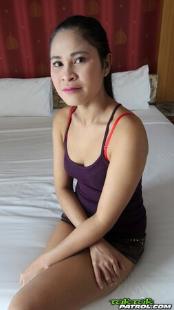 For money attractive Thai chick agrees to undress and show her trimmed muff