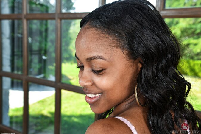Black girl Amiliah Kush exposes small boobs and then gets completely naked