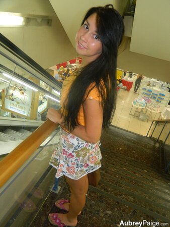 Young shopaholic acts very naughty in a fitting room located in the mall